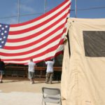 flag_raising Flag-raising at Veteran’s Village Stand Down for homeless veterans.