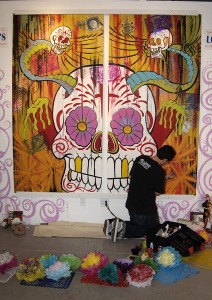 PaintLg190-212x300 An artist at work in preparation of “All Saints Day.”