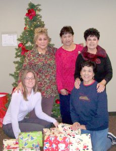 Left to right: Barbara Fink, Family Health Center of San Diego; Auxiliary member, Carmen Gomez, Youth Activity Chairman, Marcella Smith, Chaplain-Holiday Chairman, Olivia J. DeLaRosa-Solomon; Mercy Gastelum, Community Services. 