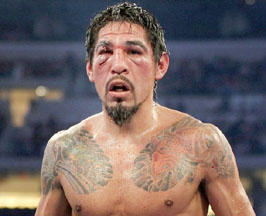 Margarito looks at Pacquiao during the ninth round of their 12 round WBC World Super Welterweight title boxing fight in Arlington