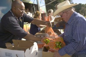 A Food Pantry Feeds Hungry People Next to the Border