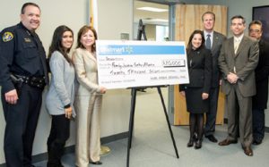 (Left to right) Executive Assistant Chief of Police David Ramirez, unidentified woman, Gael Strack, CEO Family Justice Center, Alexia Peters, Managing Attorney for Family Justice Center, Councilmember Faulconer, Lieutenant Charles Lara, San Diego Police Department and Assistant Police Chief Cesar Solis.