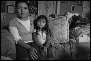 Lorena Hernandez is a 20-year-old farm worker from Oaxaca. She's a single mother of a four-year-old girl, and has been working in the fields for two years. Photo by David Bacon