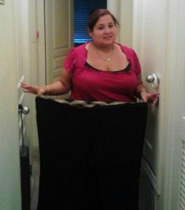 She’s half way to her goal and already she’s swimming in her old clothes.