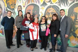 Gracia Molina de Pick (center with flowers) surrounded by Mesa College professors. Lefto to right: Professor Manuel Velez, Professor Victoria Chavez, Dionne Espinoza, Ph.D., Professor, CSULA,Gracia Molina de Pick, Community Activist Tommie Camarillo, Patricia Aguayo, Chicana Artist, and Professor Cesar Lopez, Ph.D.
