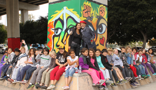 Explorer Charter Elementary school pictured with their teacher Ms Mari Jones and muralist Mario Torero.Photo by June Bayha