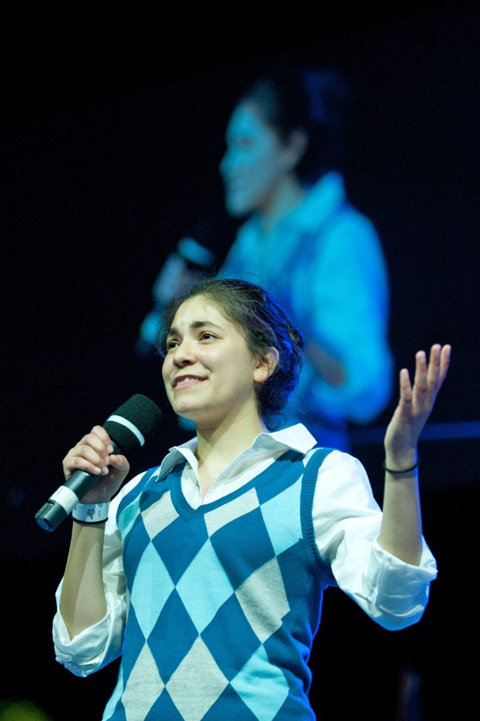 Lucerito Gutierrez shares her story in front of a crowd of over 2,000 students.