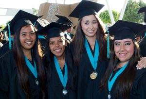 Giovanna Robledo (second from the right) and her friends on graduation day at Olympian High School, in Chula Vista.