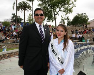 MAAC President Arnulfo Manriquez and student Alejandra Hernandez