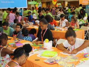 Children in the Kids Zone while parents learn about health care options.