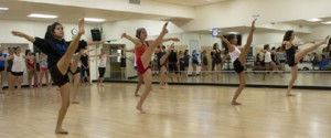 High School students practice  high-kick dance step at Grossmont College. (Photo by Stephen Harvey)  