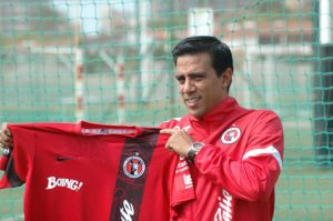 Farias new coach
