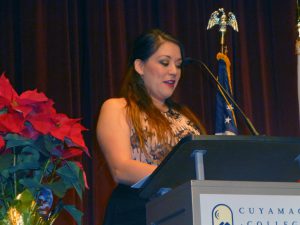 Esther Sanchez speaks in behalf of the graduating class of Grossmont College nurses in ceremony at Cuyamaca College.