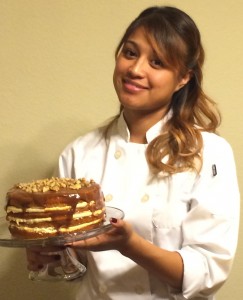 Priscilla Coronado with her delicious pumpkin cake.