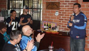 Prior to the Chargers playoff game, Alvarez address a crowd of friends who joined him to cheer on the home team.