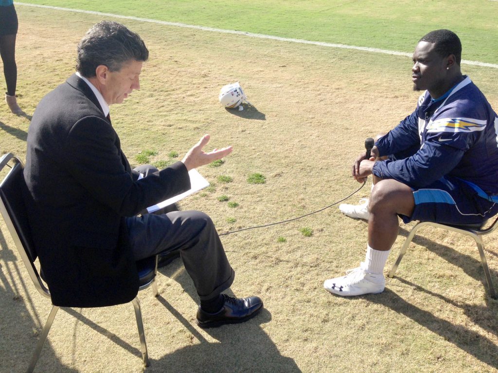 The Chargers official voice in Spanish, Jorge Villanueva, interviews Charger linebacker Melvin Ingram after practice a few days before the Chargers play against the Denver Broncos on Sunday.