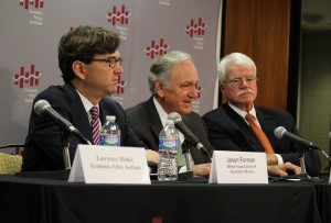 Jason Furman, chairman of the White House Council of Economic Advisers, left; Sen. Tom Harkin, D-Iowa; and Rep. George Miller D-Calif., answer reporters' questions about their proposal to raise the federal minimum wage to $10.10. SHFWire photos by Melhor M. Leonor