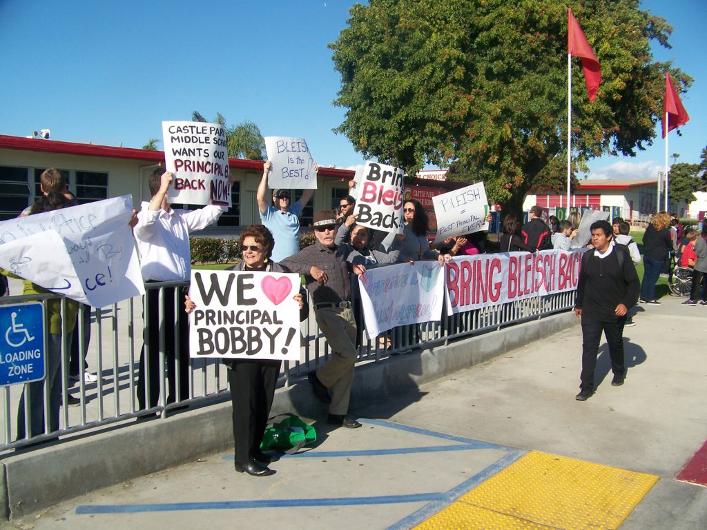 Parents of Castle Park Middle students rally in support of their Principal Robert Bleisch.
