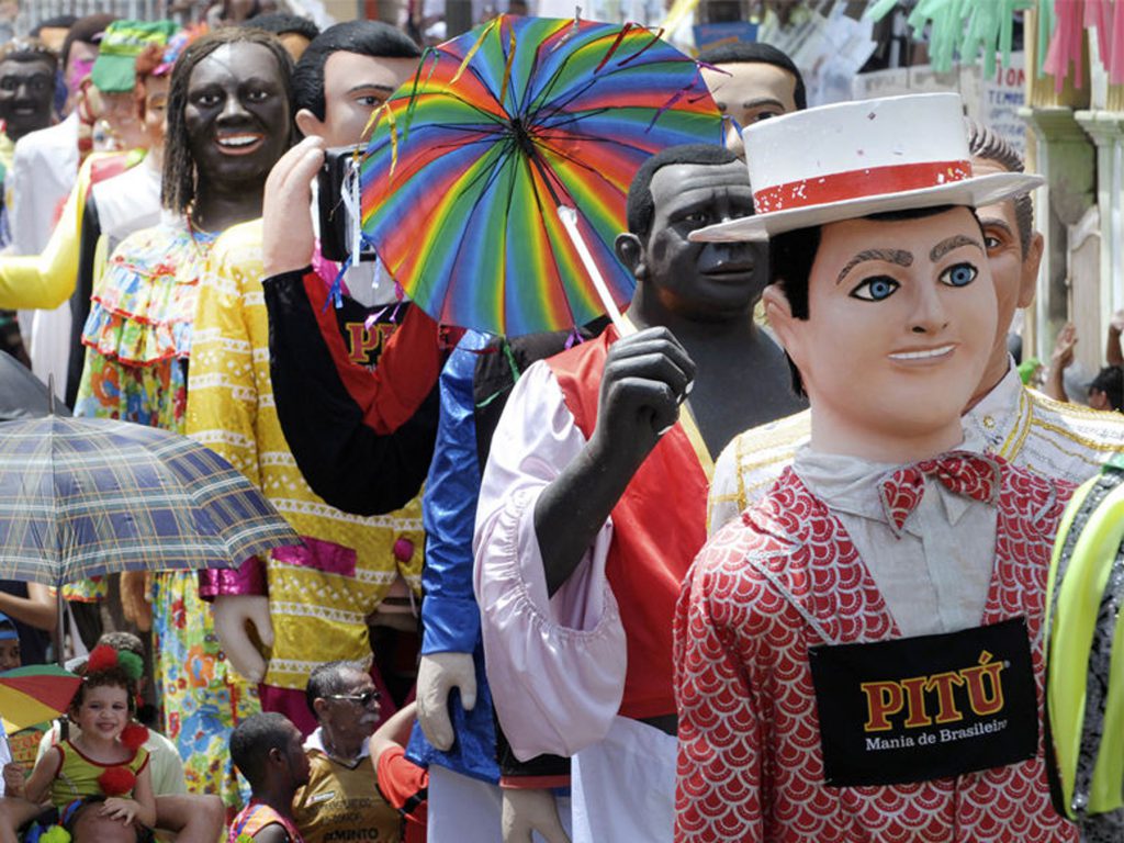 The Meeting of the Giant Puppets highlights the century-old Carnival celebration in Olinda, a historic city six kilometers from Recife’s state capital of Pernambuco. Photo Credit: Leo Caldas/AFP