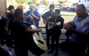 Former and current mariachi students perform before the school board meeting.