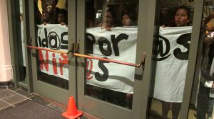 More than 100 young Latinos and their friends protest outside the Escondido Planning Comission’s 6-0 vote againsr the migrant children’s shelter on July 22. Photo by Mark R. Day