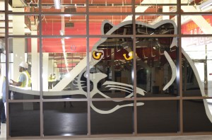 Mural of the school mascot, a Jaguar, now greets guest at the new facility.
