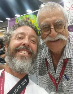 Reporter Michael Klam takes a selfie with artists Sergio Aragonés