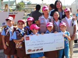 The Girl Scouts of Troop troop 5912 with Celia Lanning, the Wells Fargo Greater San Diego Region Bank President.