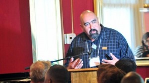 José Osuna speaks before a group of faith leaders in support of Prop. 47.