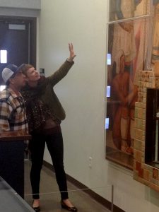 Dana Springs, director of the City of San Diego’s Commission for Arts and Culture, and commission boardmember Macedonio Arteaga, during the community celebration of the installation of the Aztec Brewing Company art at the Logan Heights library. 