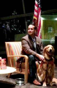 Carlos Montalván at the San Diego Central Library with his dog Tuesday.