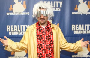 Reality Changers founder Christopher Yanov as Back to the Future’s Dr. Emmit Brown, presents the organization’s fundraising effort for 2015. Photo Credit: Carlos Solorio, Reality Changers.
