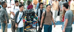 George Lopez as Fredi Cameron, left; Oscar Gutierrez as Luis Aranda, David Del Rio as Cristian Arcega, Jose Julian as Lorenzo Santillan, and Carlos Penavega as Oscar Vazquez show off a robotic model called “Stinky” in the movie “Spare Parts.” Lopez and Vazquez attended a screening of the movie in Washington. Photo (c) 2014 Ursula Coyote / Pantelion Films 
