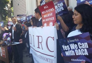 Alliance San Diego’s Christian Ramirez standing shoulder to shoulder with community members and allies to support President Obama’s executive action to keep immigrant families together. 