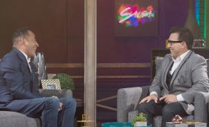 Tim Storey, left, with Pastor Sergio de la Mora, of Cornerstone Church of San Diego, one of the county’s largest Latino Christian churches, during a taping of one of TBN Salsa shows.
