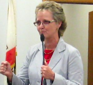 Dr. Karen Janney addresses audience at June 8 board meeting