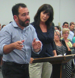 Kathryn Lembo and Mauricio Torre of SBCS field questions Sweetwater board members.