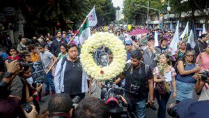 Mexican activists speaking out after the killing of Ruben Espinosa.
