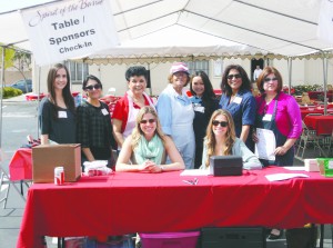 Table sponsors: center left: Chaplain Olivia J. Solomon, center right: hospital chairman Josephine Trujillo