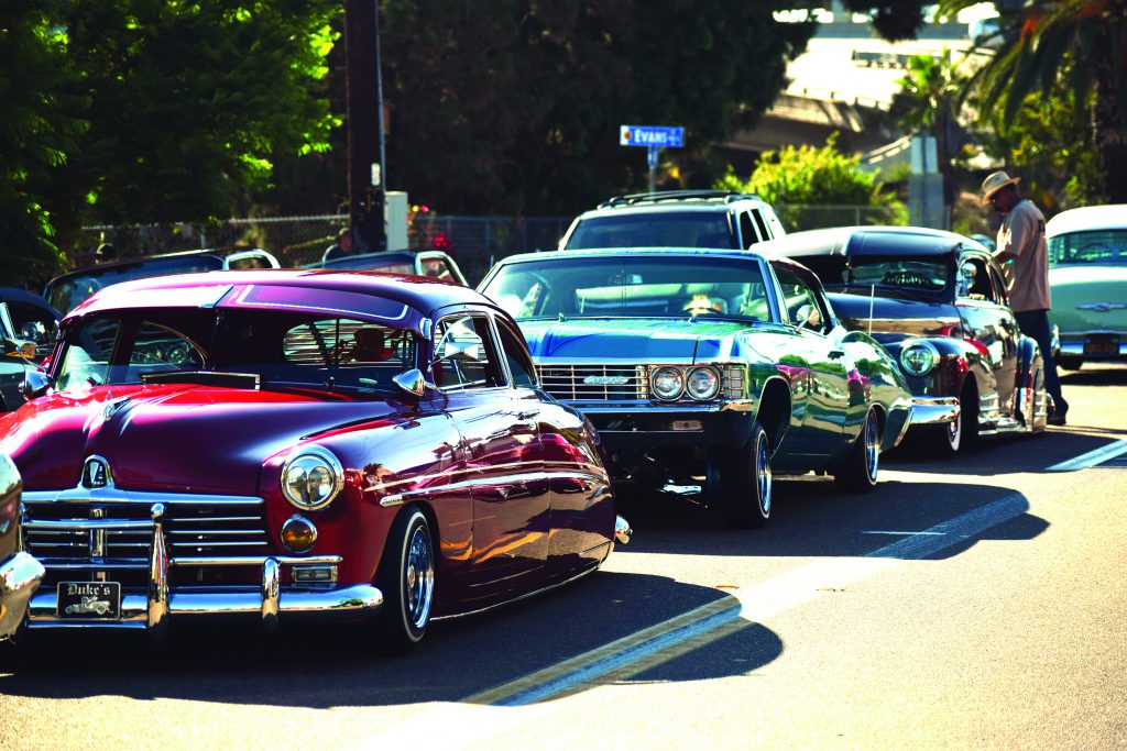 Car cruise in Barrio Logan at La Vuelta event 